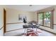 Home office with large windows, neutral paint, and a functional workspace at 5420 Crestone Cir, Boulder, CO 80301
