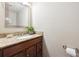 Cozy powder room with granite vanity and neutral decor creates a serene atmosphere at 3078 W 107Th Pl # D, Westminster, CO 80031