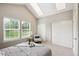 Sunlit bedroom with skylights, generous windows, and a comfortable seating area at 3078 W 107Th Pl # D, Westminster, CO 80031
