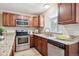 Kitchen with stainless steel appliances and granite countertops at 3078 W 107Th Pl # D, Westminster, CO 80031