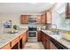 Well-lit kitchen with stainless steel appliances and granite countertops for a modern aesthetic at 3078 W 107Th Pl # D, Westminster, CO 80031