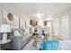 Cozy living room leading to a dining area and kitchen at 3078 W 107Th Pl # D, Westminster, CO 80031