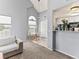 Open dining area with vaulted ceiling, bright windows and view to the kitchen at 8361 S Upham Way # 209, Littleton, CO 80128