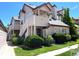 Inviting two-story townhome with well-maintained landscaping and a private balcony at 8361 S Upham Way # 209, Littleton, CO 80128