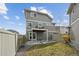 Backyard with patio, lawn, and fenced perimeter at 8095 E 128Th Pl, Thornton, CO 80602
