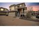 Charming two-story home featuring a two-car garage and a welcoming entrance at 8095 E 128Th Pl, Thornton, CO 80602