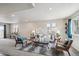 Finished basement living room with comfortable seating, recessed lights, and walkout to backyard at 8095 E 128Th Pl, Thornton, CO 80602