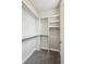 Spacious walk-in closet with ample shelving and rod space for organized storage at 8095 E 128Th Pl, Thornton, CO 80602
