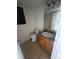 Small bathroom featuring tile flooring, vanity with granite top, and a toilet at 2005 W 86Th Ave, Denver, CO 80260