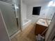 Bright bathroom featuring a shower, soaking tub and double sink vanity at 2005 W 86Th Ave, Denver, CO 80260