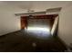 Open garage with a view to the driveway; interior walls appear to be unfinished at 2005 W 86Th Ave, Denver, CO 80260