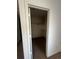 Carpeted walk-in closet with built-in shelving offers ample storage space at 2005 W 86Th Ave, Denver, CO 80260