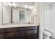 Elegant bathroom featuring a modern vanity, sleek fixtures, and tub at 2560 Wesley Ln, Lafayette, CO 80026