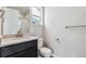 Bathroom with a modern vanity, sink, and tile flooring at 2560 Wesley Ln, Lafayette, CO 80026