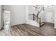 Foyer with stairs and wood-look flooring at 2560 Wesley Ln, Lafayette, CO 80026