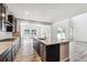 Modern kitchen with an island, stainless steel appliances, and ample counter space at 2560 Wesley Ln, Lafayette, CO 80026