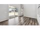 Light-filled living room with sliding glass doors leading to an outdoor space at 2560 Wesley Ln, Lafayette, CO 80026