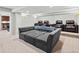 Finished basement featuring plush carpeting, recessed lighting and movie theater seating at 5497 W Prentice Ct, Littleton, CO 80123