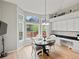 Charming breakfast nook with large windows and an eat-in dining area at 5497 W Prentice Ct, Littleton, CO 80123