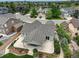 Aerial view of home showing roof, backyard, patio, and well-manicured neighborhood at 2840 Canyon Crest Ln, Highlands Ranch, CO 80126