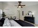 Well-appointed main bedroom featuring neutral tones, ceiling fan, and a cozy atmosphere at 2840 Canyon Crest Ln, Highlands Ranch, CO 80126