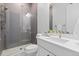 Bathroom featuring walk-in shower, and white vanity at 11412 Autumn Moon St, Littleton, CO 80125