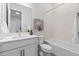 Bathroom featuring tub and shower combination and vanity at 11412 Autumn Moon St, Littleton, CO 80125