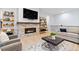 Comfortable living room with modern fireplace, plush seating, and natural light at 11412 Autumn Moon St, Littleton, CO 80125