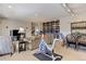 Finished basement with exercise area, living space, and dining area at 334 Humphrey Dr, Evergreen, CO 80439