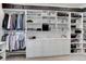 Spacious walk-in closet with ample shelving and hanging space at 334 Humphrey Dr, Evergreen, CO 80439