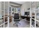 Home office with built-in desk and window seat at 334 Humphrey Dr, Evergreen, CO 80439
