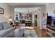 Open concept kitchen with island, stainless steel appliances, and breakfast nook at 334 Humphrey Dr, Evergreen, CO 80439