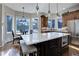 Gourmet kitchen boasts a large island, custom cabinetry, and ample counter space at 334 Humphrey Dr, Evergreen, CO 80439