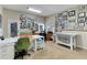 Home office with two workspaces and wall of windows at 334 Humphrey Dr, Evergreen, CO 80439
