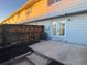 Backyard featuring a small patio, white siding, fenced in yard, and an air conditioning unit, great for relaxation at 14023 E Utah Cir, Aurora, CO 80012