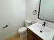 Clean bathroom with a modern vanity and updated fixtures at 14023 E Utah Cir, Aurora, CO 80012