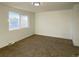 Bright bedroom featuring a large window and neutral walls at 14023 E Utah Cir, Aurora, CO 80012