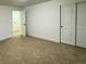 Spacious bedroom with carpet and ample closet space at 14023 E Utah Cir, Aurora, CO 80012