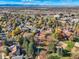 Aerial view of homes showcasing neighborhood landscape and mountain views at 11854 Vallejo St, Denver, CO 80234