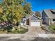 House exterior view with landscaping and driveway at 11854 Vallejo St, Denver, CO 80234