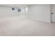 Spacious and carpeted basement with neutral walls at 11854 Vallejo St, Denver, CO 80234