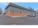 Apartment building with a brick foundation and siding, plus off-street parking at 5700 W 28Th Ave # 6, Wheat Ridge, CO 80214