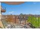 View from the balcony offering a glimpse of the surrounding neighborhood, along with outdoor seating at 15475 Andrews Dr # 314, Denver, CO 80239
