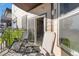 Relaxing balcony with outdoor seating and pleasant neighborhood views at 15475 Andrews Dr # 314, Denver, CO 80239