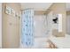Bathroom featuring a shower with tub and vanity at 15475 Andrews Dr # 314, Denver, CO 80239