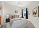 Cozy bedroom featuring neutral tones, soft lighting, and a comfortable bed at 15475 Andrews Dr # 314, Denver, CO 80239