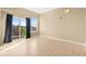 Bright living room with large windows and hard surface flooring at 15475 Andrews Dr # 314, Denver, CO 80239