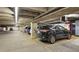 Indoor parking garage with EV charging station at 888 N Logan St # 11E, Denver, CO 80203