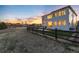 Expansive backyard featuring a patio, fence, and views of the neighborhood in the distance at 11582 Jimenez St, Parker, CO 80134