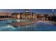 Community clubhouse and pool area with lounge chairs and tables, perfect for recreation at 11582 Jimenez St, Parker, CO 80134